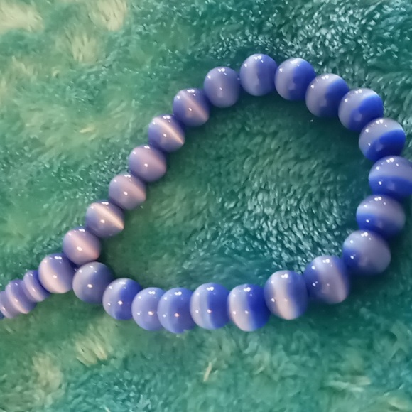 4 beaded cats eye quartz like bracelets 4 different colors. Adjustable - Picture 4 of 6